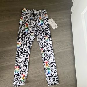NWT ATHLETA ELATION TRAIN 7/8 Tight Leggings PRIDE XS RAINBOW Black White